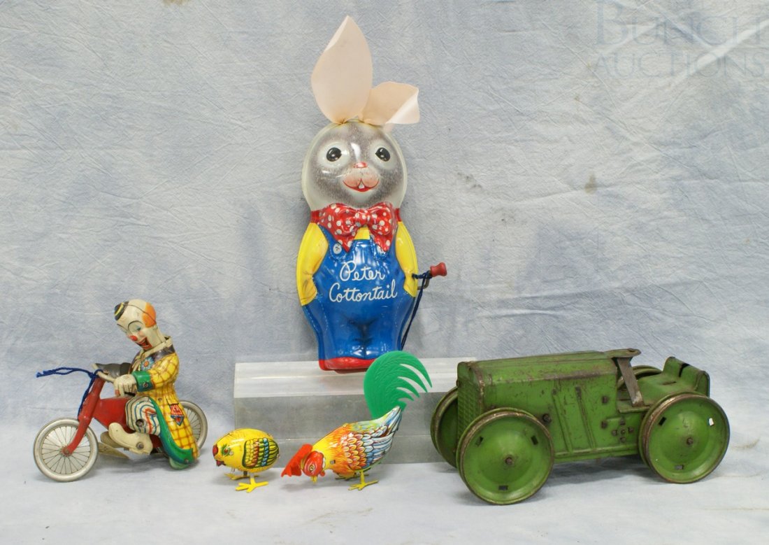 Lot of (5) Tin Litho Toys, including a MARX Tin W: Lot of (5) Tin Litho Toys, including a MARX Tin Wind Up NY 200-5-AVE Tractor (marked Patent no 1,334,539), a wind up clown (marked Made in US Zone Germany and missing key), a Kohler wind up rooster (m