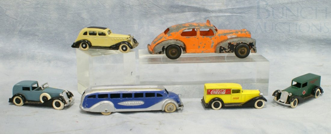 Lot of 6 toy cars: including: Hubley Die-Cast Cad: Lot of 6 toy cars: including: Hubley Die-Cast Cadillac taxi (paint loss), marked "Hubley Kiddie Toy Made in USA 459", and 4 smaller metal cars (probably cast iron) with rubber wheels, and a Tootsie To