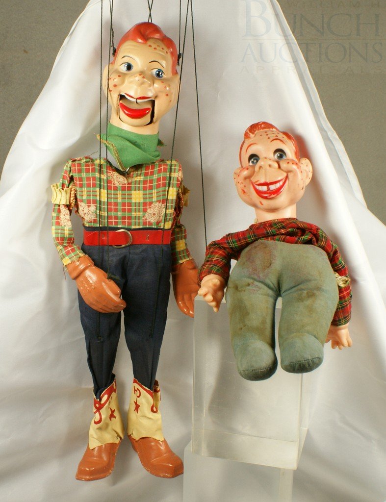 2 Howdy Doody Dolls: 1 Marionette, good condition: 2 Howdy Doody Dolls: 1 Marionette, good condition, minor paint loss to boots, 24" tall outstretched, no box together with a Goldberger Doll Mfg. Co plastic head and bean filled cloth body Howdy Doody