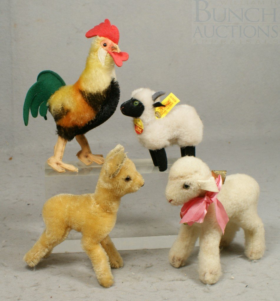 4 Steiff Animals: "Snucki" (with ear button and c: 4 Steiff Animals: "Snucki" (with ear button and chest tag), "Lamby" (missing ear button), together with a deer and a rooster (missing ear button and chest tag), tallest 7"