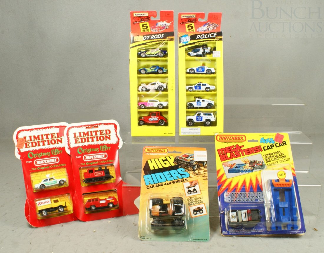 6 Matchbox Toy Cars in original boxes including:: 6 Matchbox Toy Cars in original boxes including: Limited Edition Christmas Offer, Hot Rods and Police 5-packs, Megablasters, and High Rider
