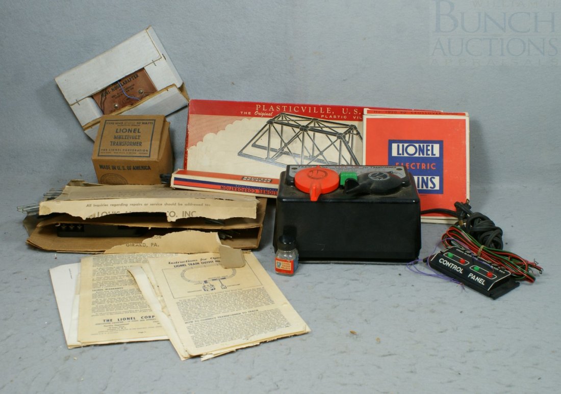 Lionel Accessory Lot including Multivolt transfor: Lionel Accessory Lot including Multivolt transformer type 1043, Transformer type TW, Large radius remote control switch set with lights, remote control track set #6009, 90 degree crossover #1020, smok