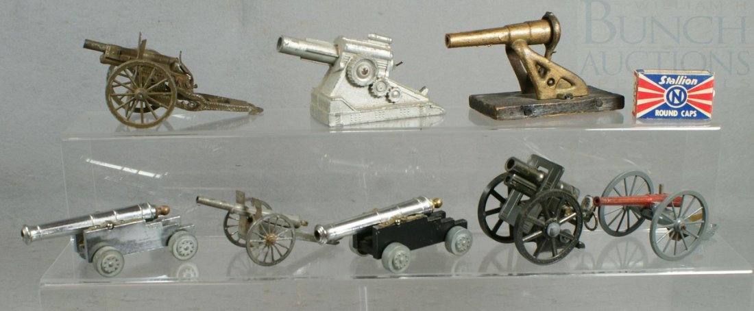 8 Functioning Toy Cannons with a box of Stallion: 8 Functioning Toy Cannons with a box of Stallion round caps, longest 5-1/2"