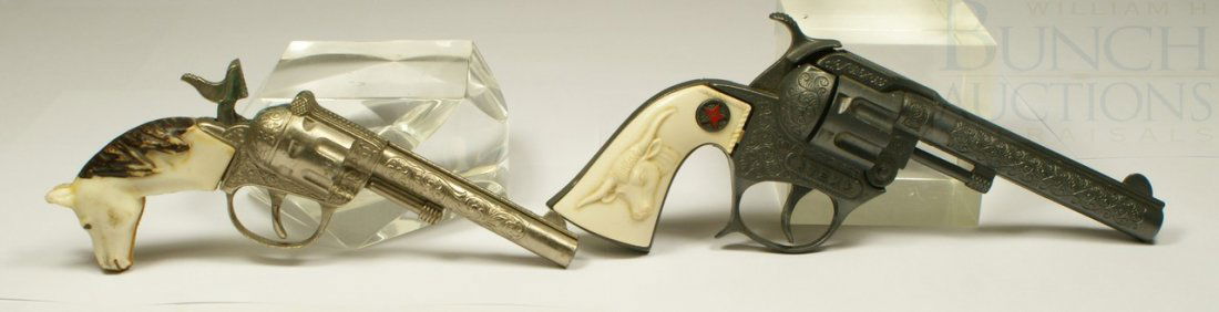 2 Hubley Cap Pistols with celluloid grips, inclu: 2 Hubley Cap Pistols with celluloid grips, including 1940 Tex, largest 8"