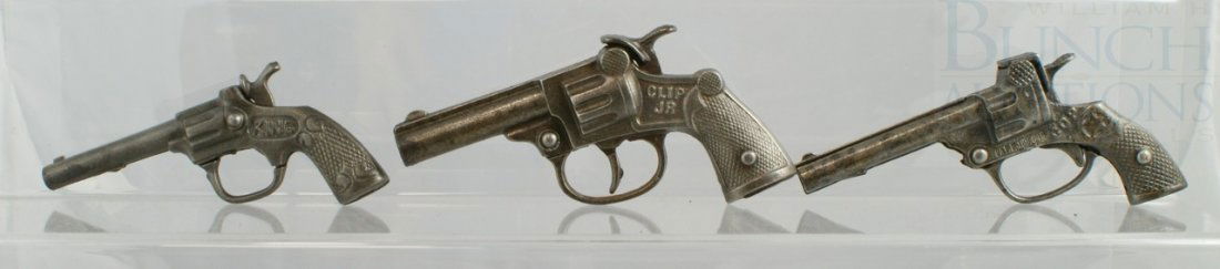 3 Cast Iron Cap Pistols including 1930 Stevens K: 3 Cast Iron Cap Pistols including 1930 Stevens King, 1935 Stevens Clip Jr, and 1930 Hubley Cop, longest 5-1/4", in working order