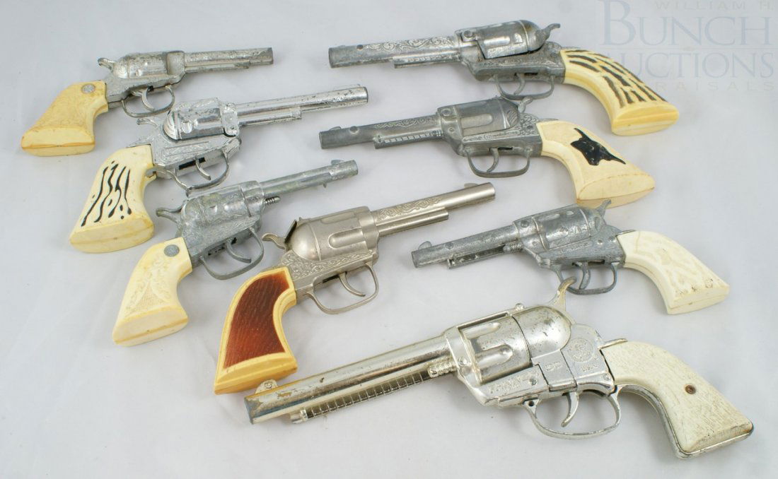 Lot of 8 Toy Cap Pistols with celluloid grips, s: Lot of 8 Toy Cap Pistols with celluloid grips, some Hubley, longest 11"