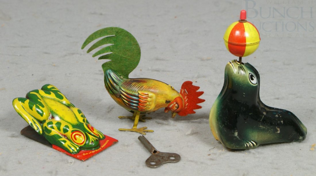 3 Tin Litho Toys including Lehman Seal, Frog Cli: 3 Tin Litho Toys including Lehman Seal, Frog Clicker and a key wind chicken