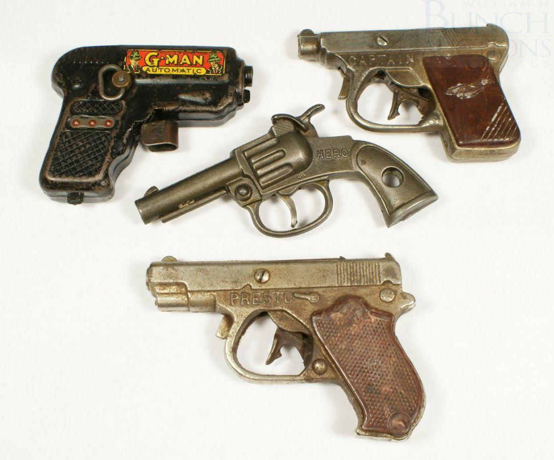 4 Toy Cap Pistols, including 3 cast iron: 1937 S: 4 Toy Cap Pistols, including 3 cast iron: 1937 Stevens Hero (missing grips), 1940 Kilgore Captain, 1940 Kilgore Presto, and a G Man Automatic Wind Up Gun, largest 5-1/2", in working order