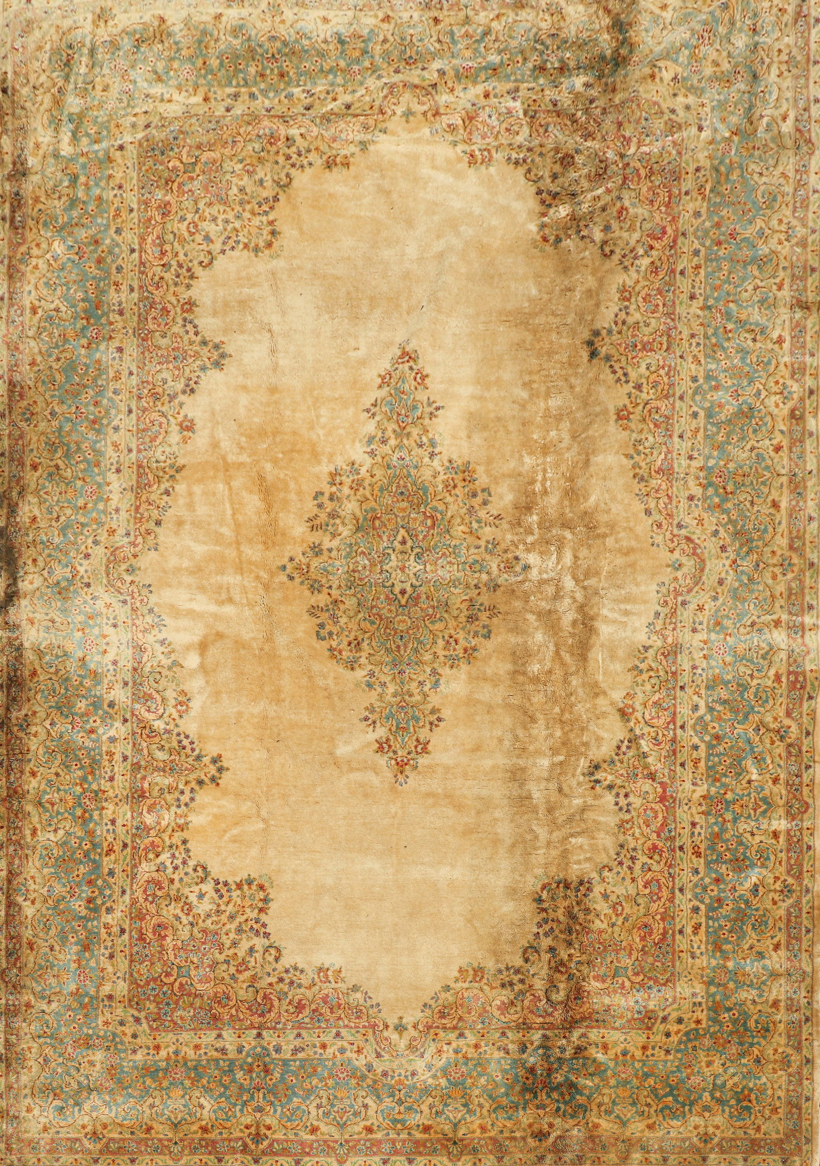 10'9" x 18'6" Pastel Kirman: 10'9" x 18'6" Pastel Kirman, water stains, expected wear, please see photos for any specific condition concerns