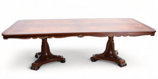 Regency Style Banded & Inlaid Mahogany & Burlwood Dining Table: Regency Style Banded & Inlaid Mahogany & Burlwood Dining Table, scalloped skirt with leaf decoration, double pedestal with parcel gilt decoration with bellflower decoration on base, on scrolled