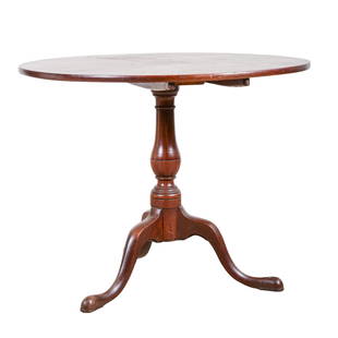 Walnut Queen Anne tilt top tea table: Walnut Queen Anne tilt top tea table, flat edge top, 26" x 36-7/8", on a blaster turned stem on cabriole leg base on pad feet, unusual wrought iron catch on underside