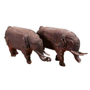 Pair carved wood elephants: Pair carved wood elephants, according from unverified provenance from carnival in north Jersey, old painted surface, one needing repair to leg, 48"l x 29"h