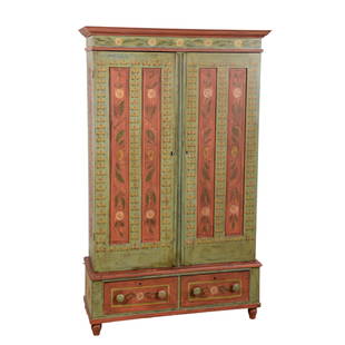 Pine 2-part storage cupboard: Pine 2-part storage cupboard, top section with moulded cornice over two paneled doors, concealing 3 shelves inside, on base with two drawers raised on turn feet, decorated with floral paint on pale