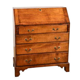 NE figured maple slant front Chippendale desk: NE figured maple slant front Chippendale desk, interesting interior with pinwheeled central carved drawer, 4 graduated lipped drawers, raised on scalloped bracket feet, 35-3/4"w x 43"h x