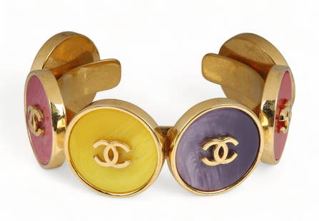 Vintage Chanel Lagerfeld Button Cuff Bracelet: Vintage Chanel Lagerfeld Button Cuff Bracelet, 1984-1987, gold tone metal and resin 'button' formed bracelet, "Coco Chanel personally adored these bracelets and would wear them constantly, notable sta
