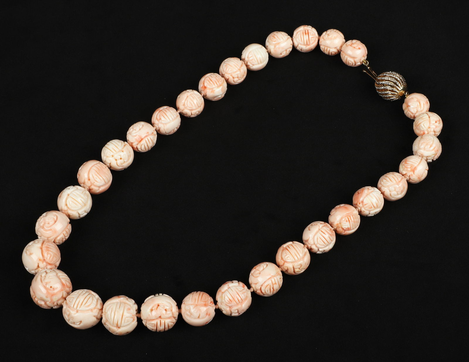 A Carved Coral Bead Necklace (1 of 5)