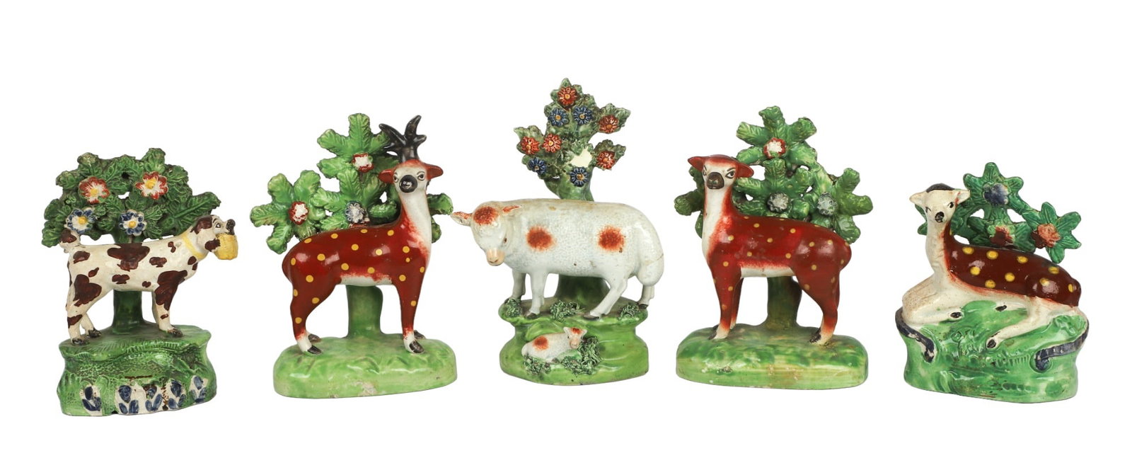 (5) Staffordshire Pearlware Bocage Animals: (5) Staffordshire Pearlware Bocage Animals to include a sheep with lamb, 6 1/2"H, some damage to shrubbery, a spotted male and female deer pair, 5 3/4"H and 6"H, a spotted deer lying down, 4 3/4"H and