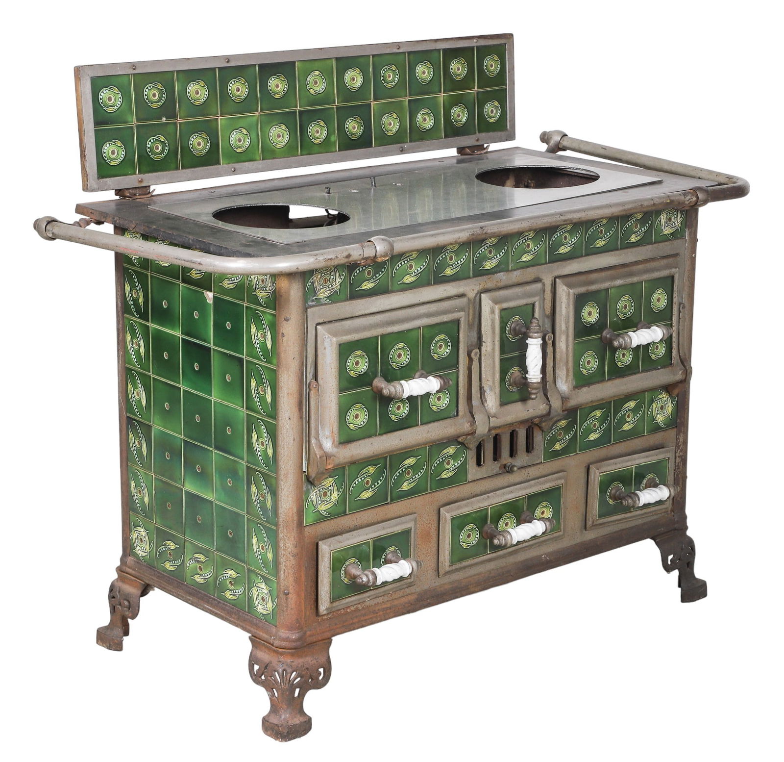Iron and tiled stove: Iron and tiled stove, green flower and leaf decorated tiles, 39"h x 46"w x 24"d