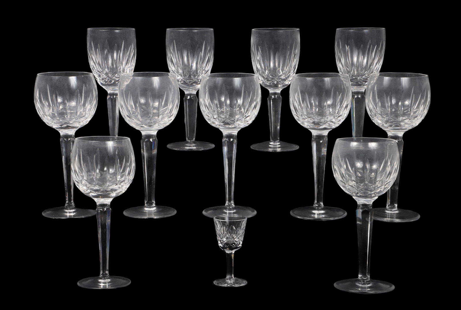 (12) Pcs Waterford crystal stemware: (12) Pcs Waterford crystal stemware, Lismore pattern, c/o (7) 7-3/8" plain foot balloon wine glasses, (4) 6-1/2" plain foot wine glasses, (1) 3-3/8" cut foot cordial, all glasses are cloudy, sick from
