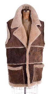 French Creek Shearling Long Vest: French Creek shearling long vest, L, faux wood double button closure, 50" chest, 34" L shoulder to hem.