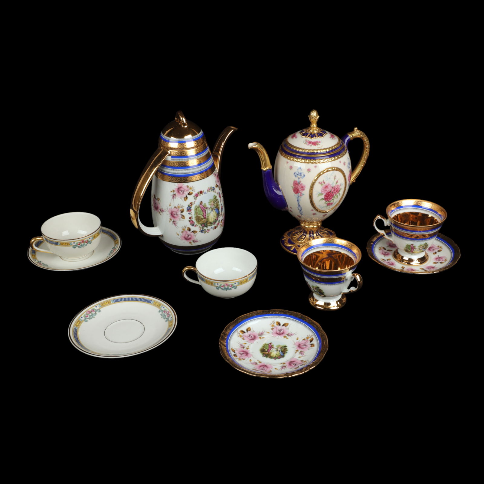 (10) Pcs Porcelain: (10) Pcs porcelain, c/o House of Faberge Imperial Egg teapot (9" h), Limoges Royale teapot with (2) cup & saucer sets, (2) Bernardaud & Co Limoges Lafayette teacup & saucer sets