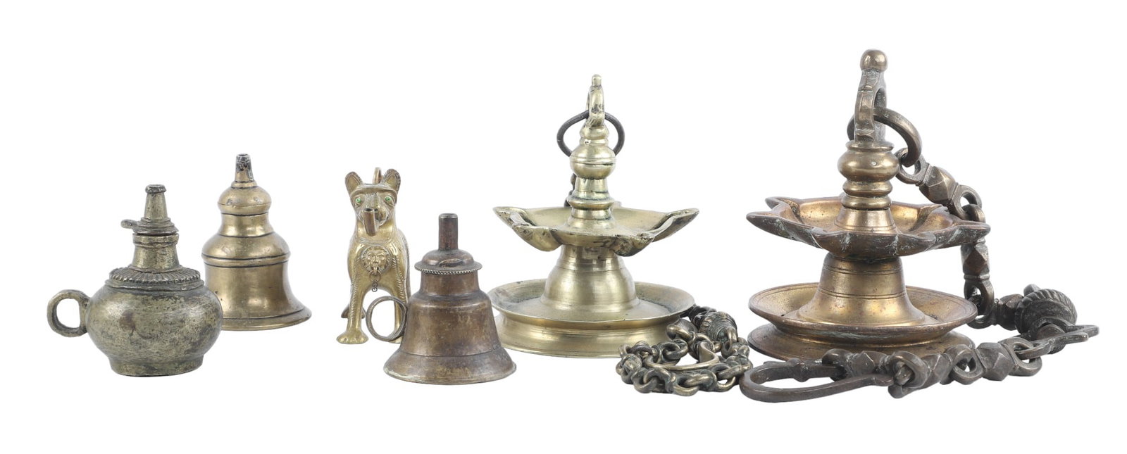 (9) Brass and Mixed Metal Oil Lamps: (9) Brass and Mixed Metal Oil Lamps to include (3) handled lamps, 3 3/4"H tallest, (2) hanging brass diya lamps, (3) brass and mixed metal bird form oil lamps, 9"H tallest along with a brass lion form