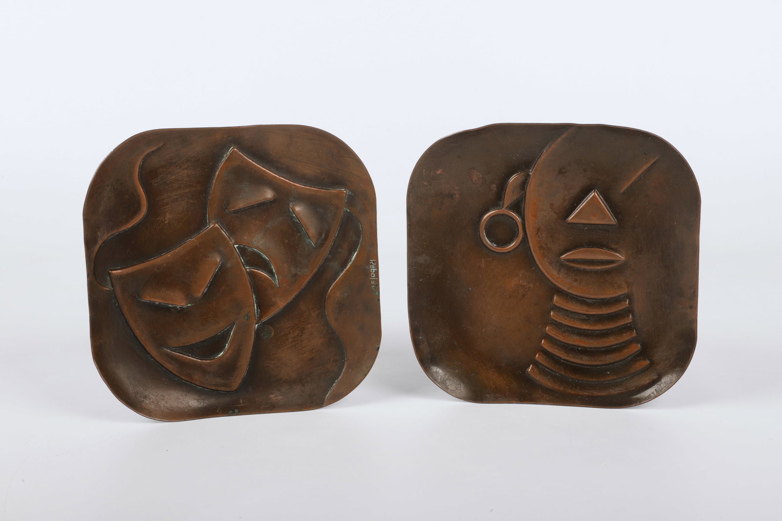 (2) Francisco Rebajes Copper Trays: (2) Francisco Rebajes copper trays, signed, 5-7/8" sq, c/o comedy & tragedy masks, African Ubangi Woman