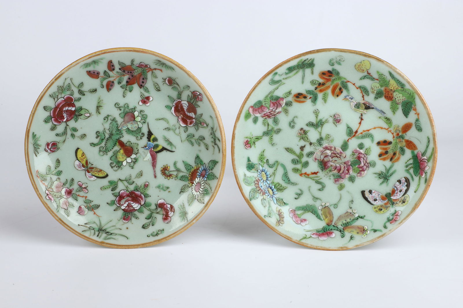 (2) Chinese Celadon Porcelain Plates: (2) Chinese celadon porcelain plates, floral & butterfly decoration, seal mark to base, 7-1/4ï¿½ dia