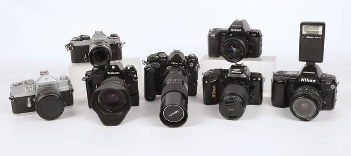 (7) Nikon 35 mm Film Cameras: (7) Nikon 35 mm film cameras to include (1) N8008, (1) N4004, (1) EM, (2) FE, (1) N90S and (1) Nikkorex F with misc. lenses and accessories