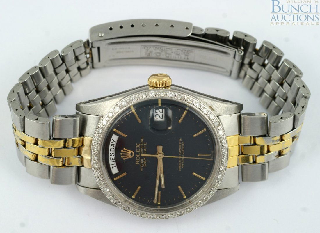 Stainless steel Rolex "Tudor" mans wris: 14K YG & stainless steel Rolex "Tudor" mans wrist watch fitted with a black Rolex Oyster Perpetual dial and diamond bezel, Tudor 2 tone band, manual wind. The watch has been opened by a Rolex technici