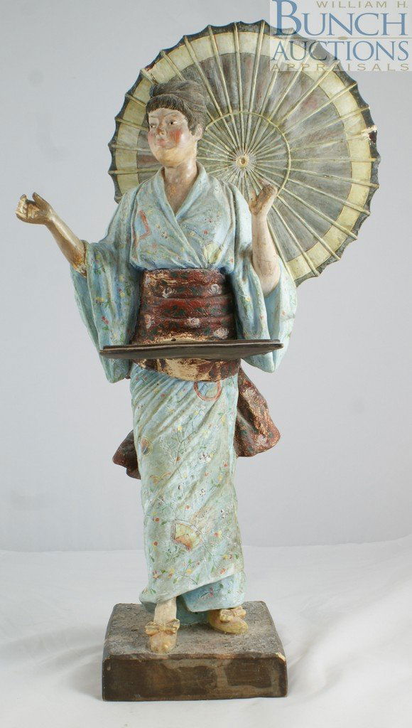 Amphora pottery figurine of a geisha, repaired b: Amphora pottery figurine of a geisha, repaired base and parasol, some damage to fingers on hands, 22" high, impressed CR / 1455 on base