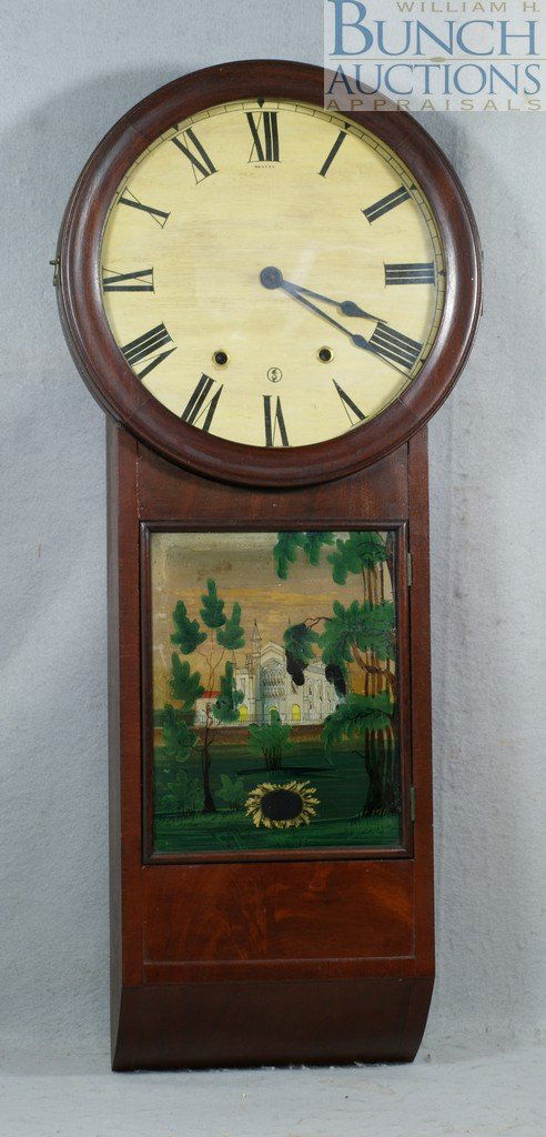 E Ingraham mahogany wall regulator, time and hou: E Ingraham mahogany wall regulator, time and hour strike, unsigned, repainted dial, cast iron mount for spiral wire chime embossed E Ingraham & Co, rev painted panel depicting a large building with sp