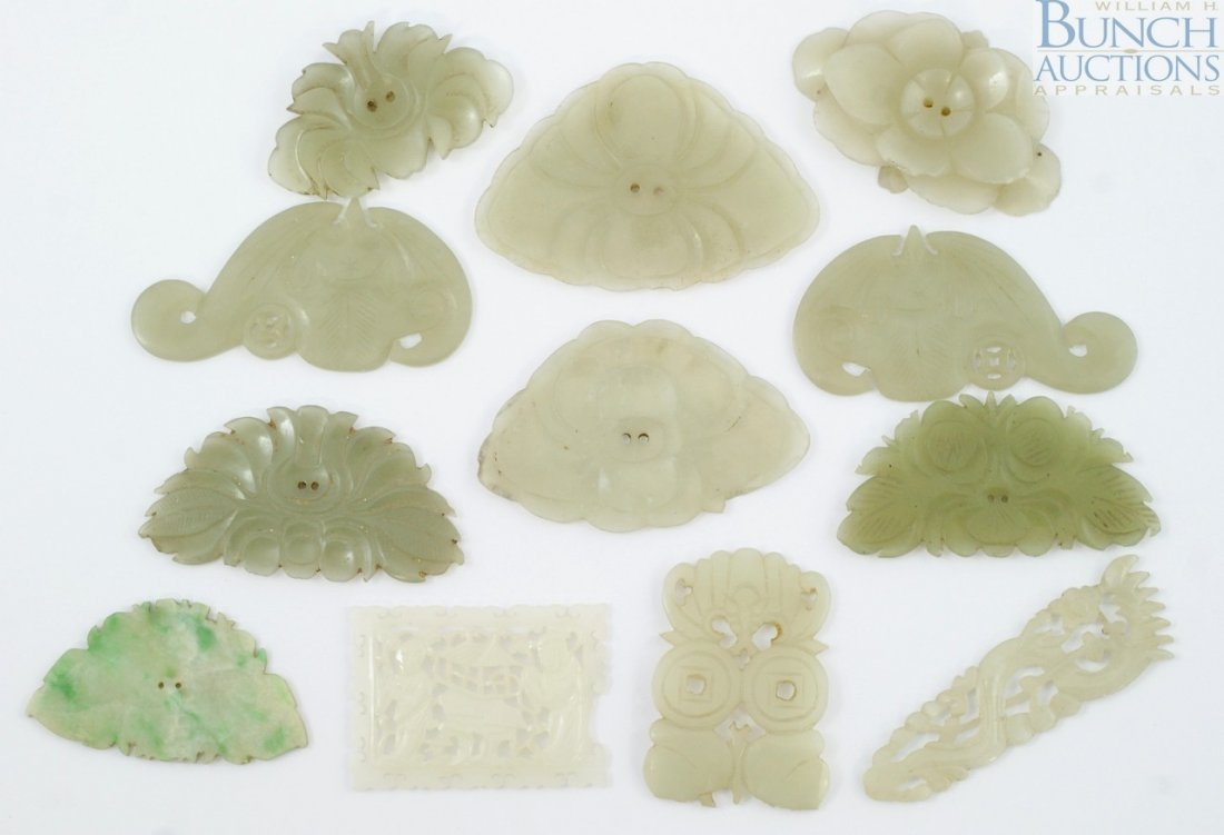 12 pcs Chinese carved jade ornaments. Lotus, bat: 12 pcs Chinese carved jade ornaments. Lotus, bats etc. Largest measuring 2"