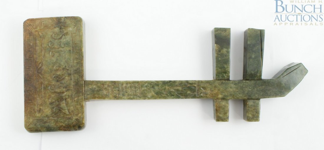 Chinese carved jade violin (Hu-Chin) with carved: Chinese carved jade violin (Hu-Chin) with carved tiger faces and seal character inscription, See P de Tanner Chinese Jade Vol 1 Plate 61 #2530 Approximately 13"