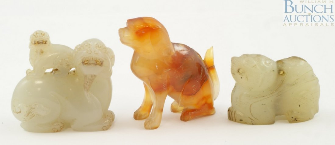 3 Chinese carved hardstone pcs to include a myth: 3 Chinese carved hardstone pcs to include a mythical animal with baby on back, Another mythical animal, and a carnelian dog with chip to its tail, largest measuring 2 1/8" high