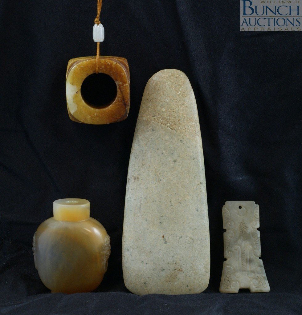 4 pcs Chinese stone to include an ax form, a snu: 4 pcs Chinese stone to include an ax form, a snuff bottle with lion mask handles, a pendant, and an earth shaped bead, Largest approximately 5"