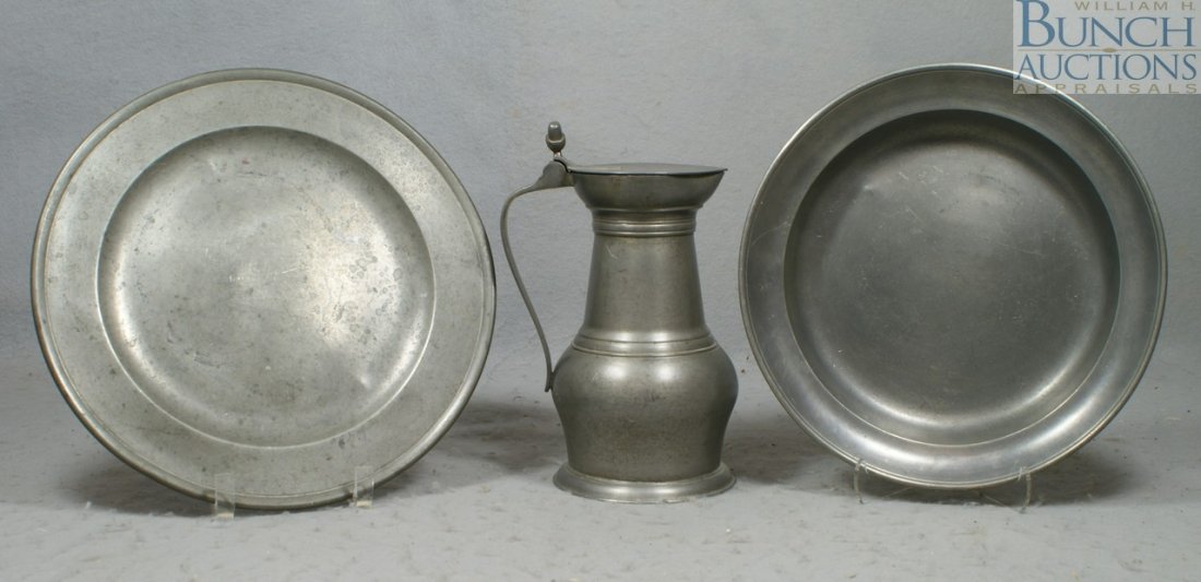 3 pcs of pewter, to include a continental flago: 3 pcs of pewter, to include a continental flagon mug, 8 1/2" high, together with a faintly marked shallow bowl and a poole charger