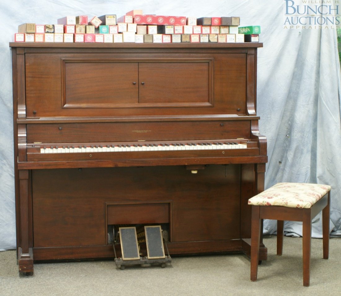 Mahogany Cunningham upright player piano, conve: Mahogany Cunningham upright player piano, converted to electric, manual operating condition, 60+ rolls, about 60” w”