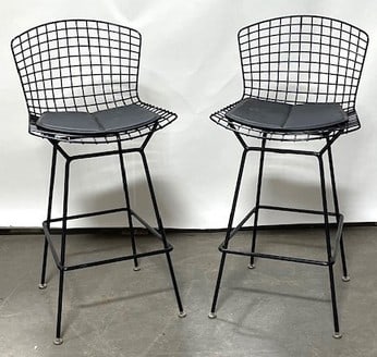 Pair of Knoll Harry Bertoia counter stools: Pair of Knoll Harry Bertoia counter stools, black wire mesh with black seat pad, 42"H x 19"W x 19"D