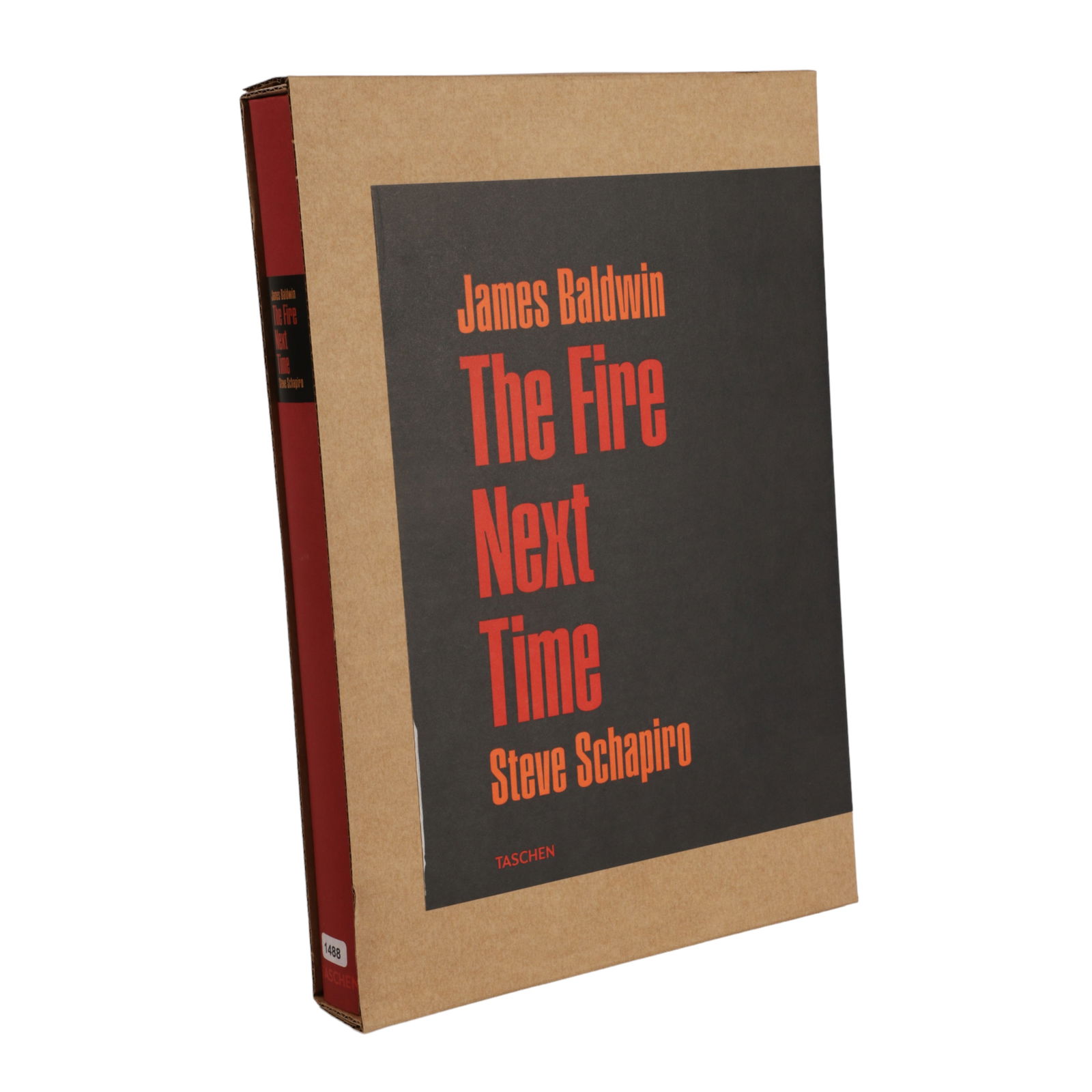 [Signed] The Fire Next Time by James Baldwin: A copy of The Fire Next Time by James Baldwin with photography by Steve Schapiro. Signed by Schapiro on the limitation page. In the original box from the publisher, Taschen, which records, "This book