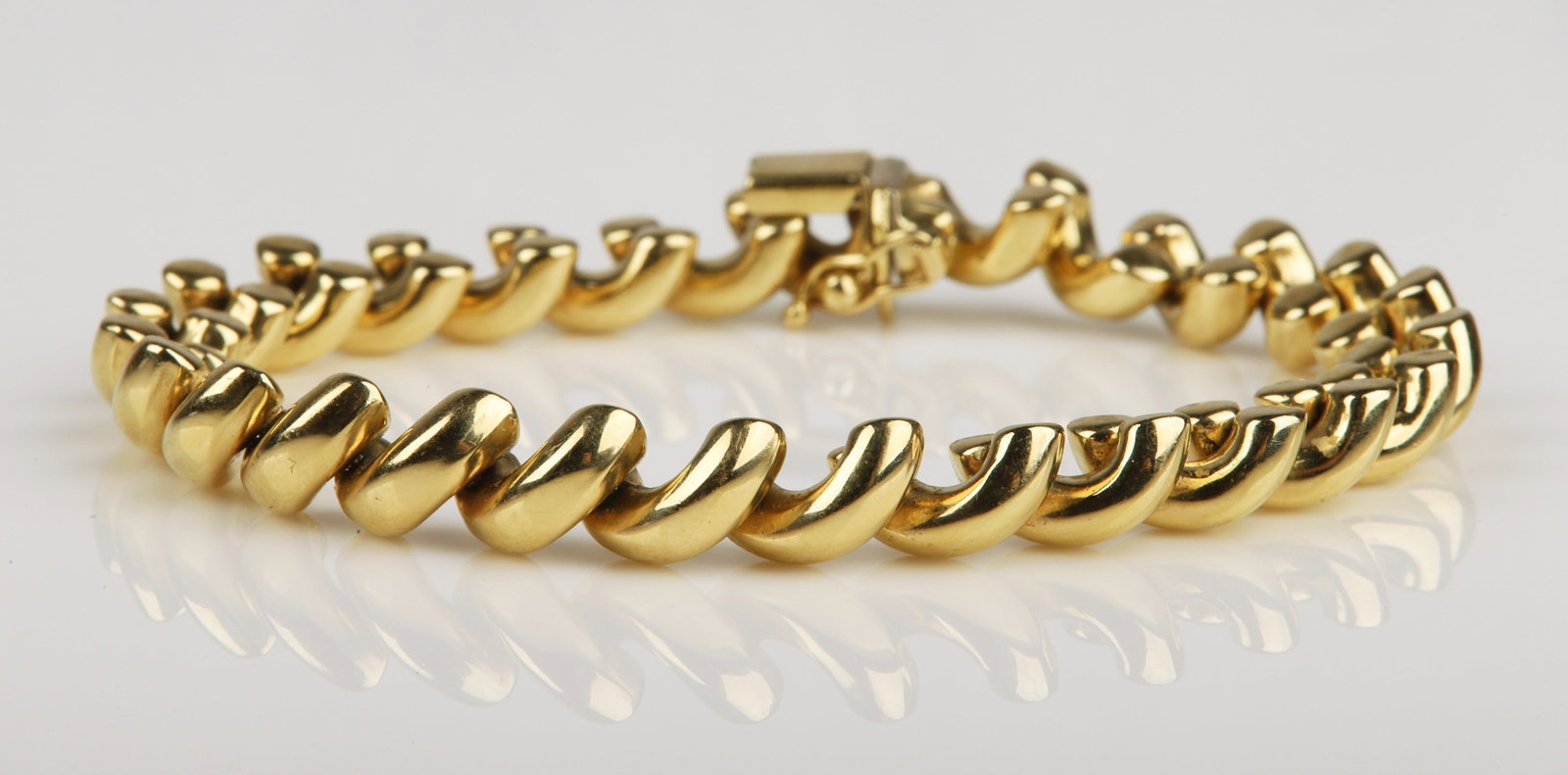 14K Yellow Gold Milor Italian Bracelet: 14K yellow gold Milor Italian bracelet, 7 1/2"L, 10.2 DWT, stamped 14K at closure