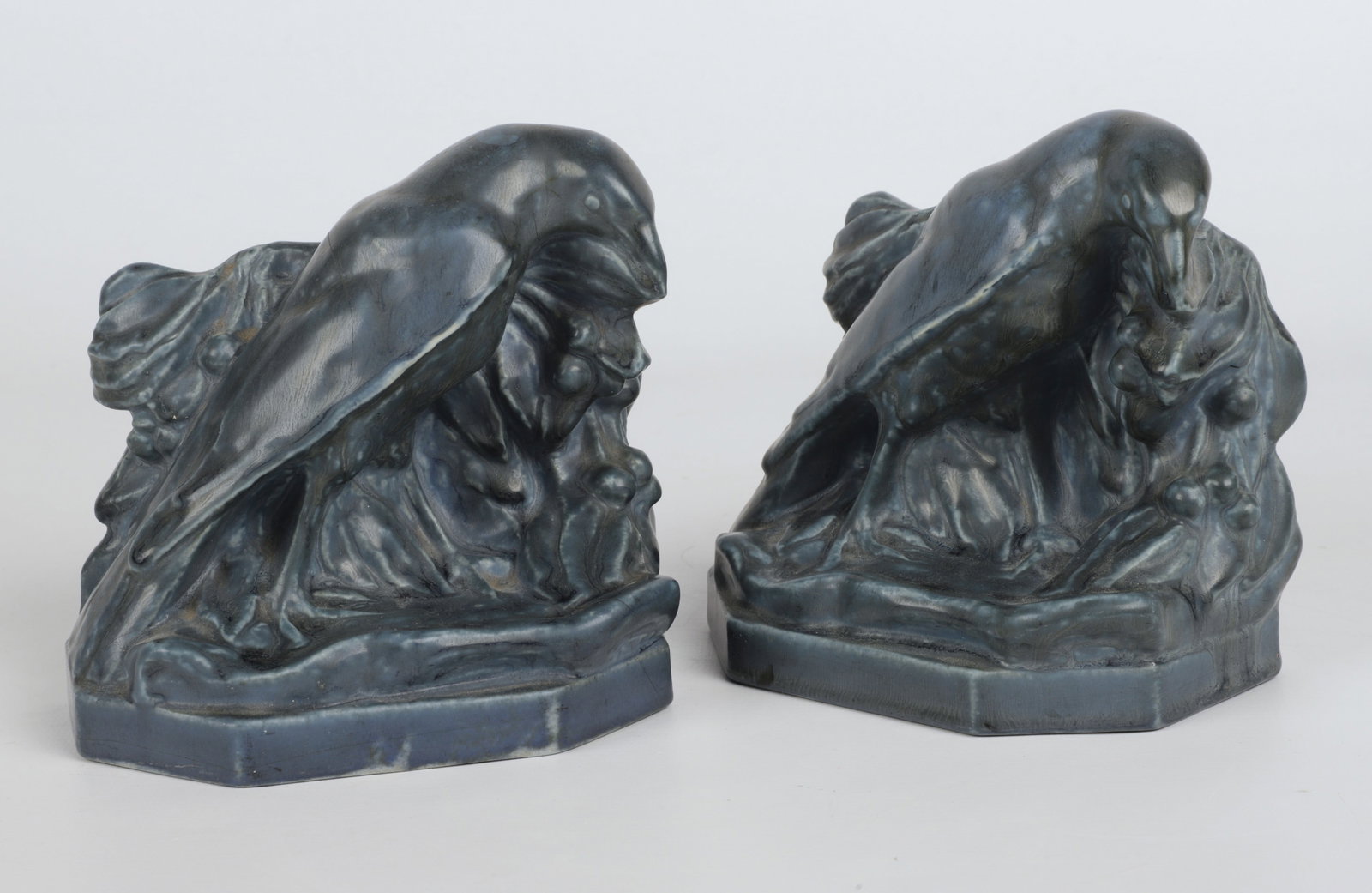 Pair of Rookwood Pottery Bird Bookends: Rookwood Pottery bird bookends, dark blue green, No 2275, by William McDonald, 1934, 5-1/4" x 3-1/8" x 5-1/4" h