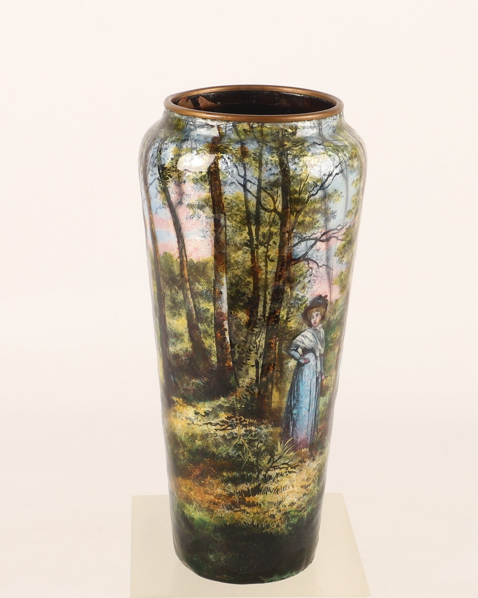 Jules Sarlandie (1874-1936) Enamel Vase: Jules Sarlandie (1874-1936) enamel on copper vase, Edwardian woman in forest landscape, signed "J Sarlandie Limoges", 7" h, chip to enamel on back