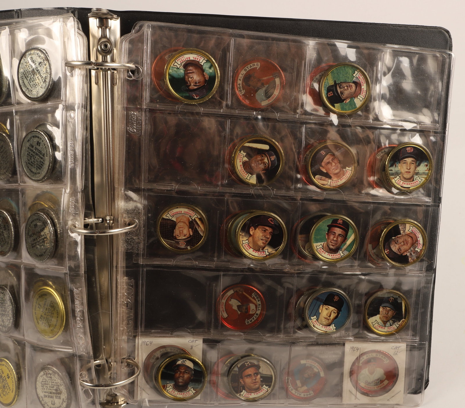 Lot - 96 1964 Topps Coins incl. HOF's: This lot is a binder of 96 1964 Topps Coins many vg and others ex/ex+, Coins include All Stars Kaline, Brooks R., Ford, Mantle (vg), Clemente, Mays, Marichal, Koufax (f-g) amongst others. Regular coin