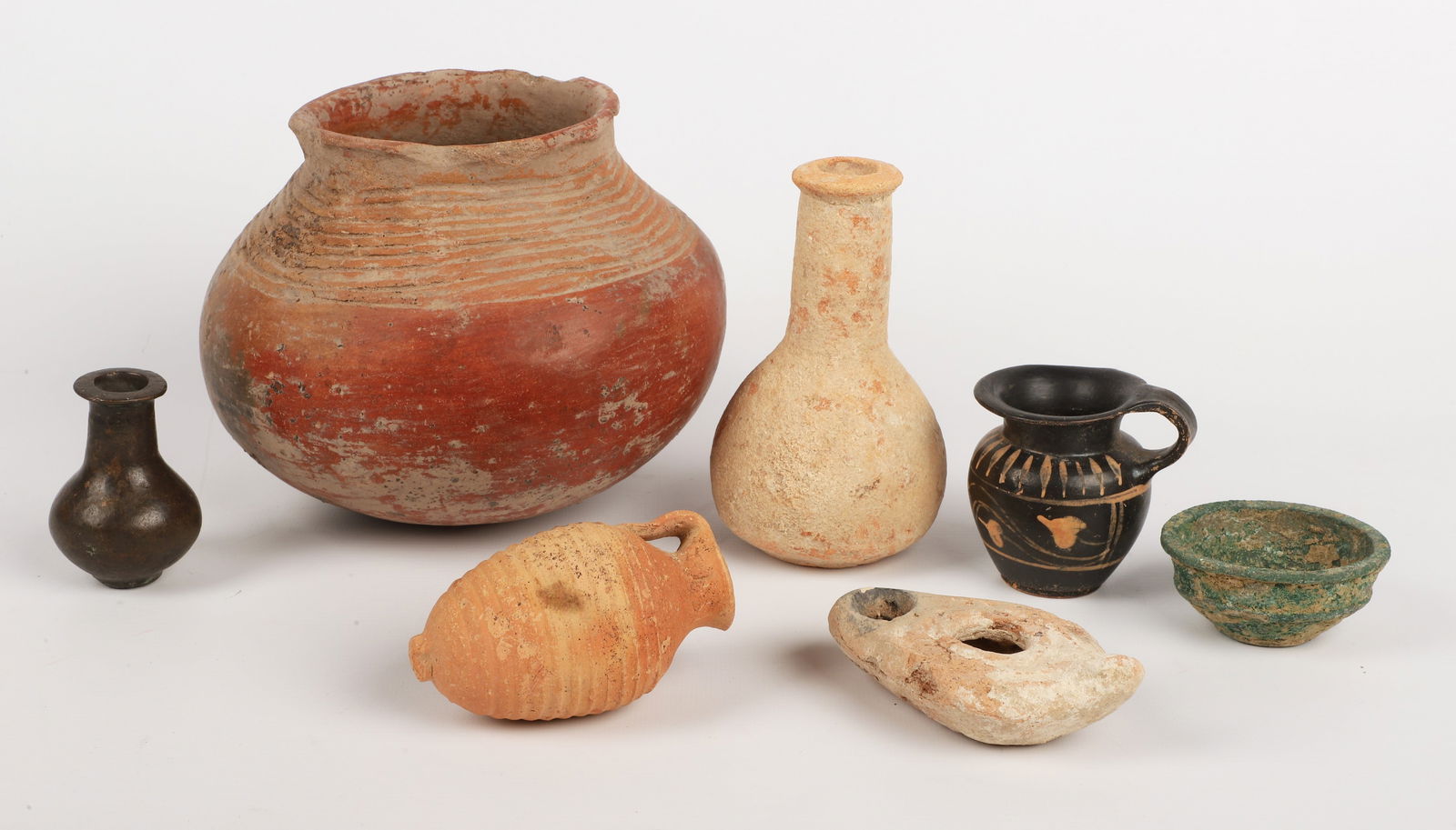A Group of (7) pottery and bronze antiquities (1 of 8)