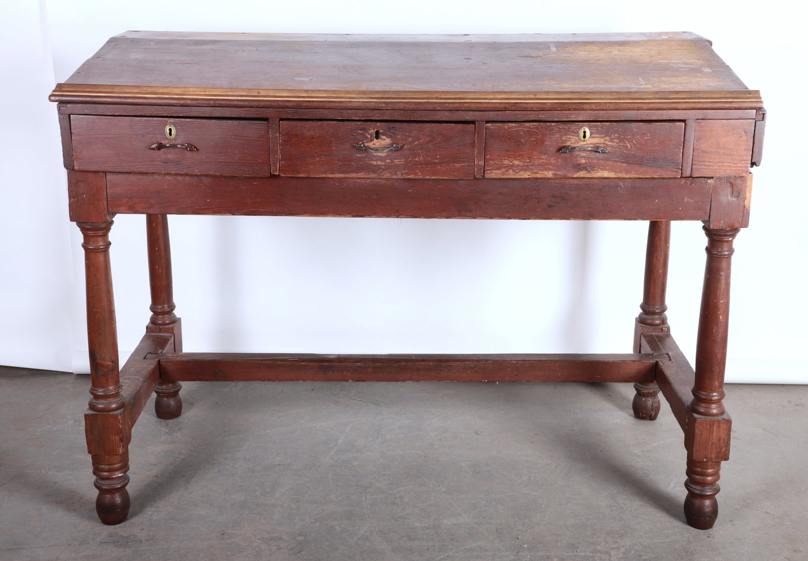2-Piece shipper's desk: 2 piece shipper's desk, 3 plank top over 3 drawers atop 4 columned base with dovetailed stretcher over turned feet, missing gallery, 47"H x 64"W x 30"D