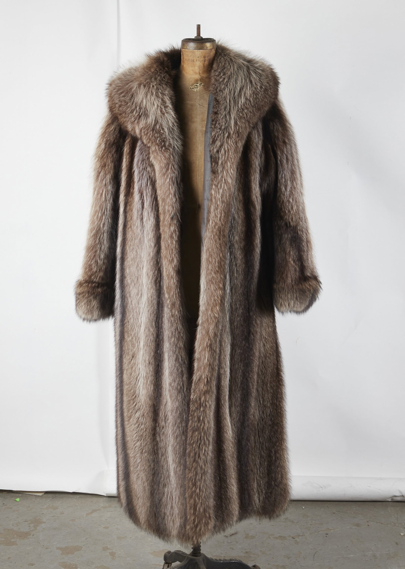 Full length raccoon fur coat: Full length raccoon fur coat, high quality, draped hem, oversized sleeves and collar, very good condition, 40" bust, 52" shoulder to hem