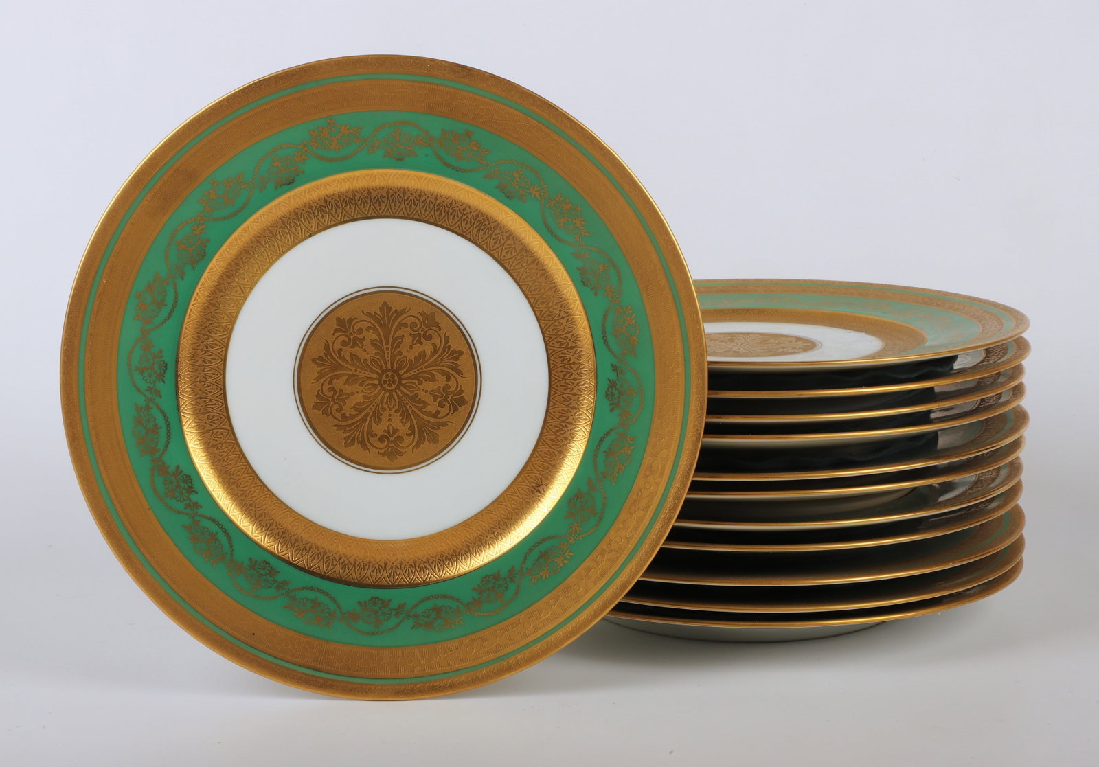 (12) Bohemia Bailey Banks & Biddle plates: (12) Bohemia Czechoslovakia porcelain plates, green & gold border, retailed by Bailey Banks & Biddle, 10-3/4" dia