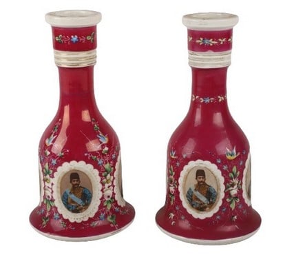 Persian porcelain portrait huqqa pair: Persian porcelain portrait huqqa pair, hand painted bird and florals surround transfer Quajar portraits, Naser al-Din Shah and Mozaffar al-Din Shah, 10 3/4"H, lacking covers, F&M mark to base, 19th C.