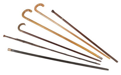 (6) 19th and 20th C walking sticks: (6) 19th and 20th C walking sticks to include a gold filled floral decorated handled walking stick, monogram at top, 34 3/4"L, horn handled wood bodied walking stick, 35"L, faux horn walking stick, 35